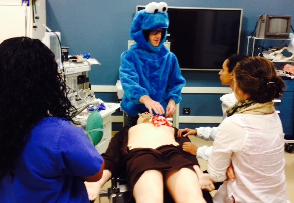 Scott Evans teaches medical student during a simulation activity