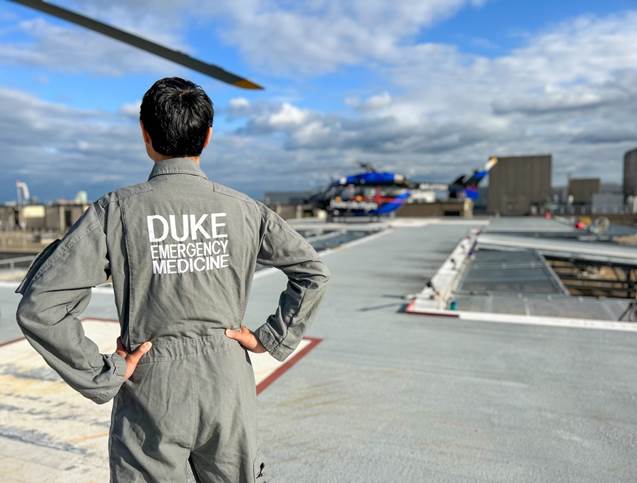 EM provider looking at Duke Life Flight helicopter