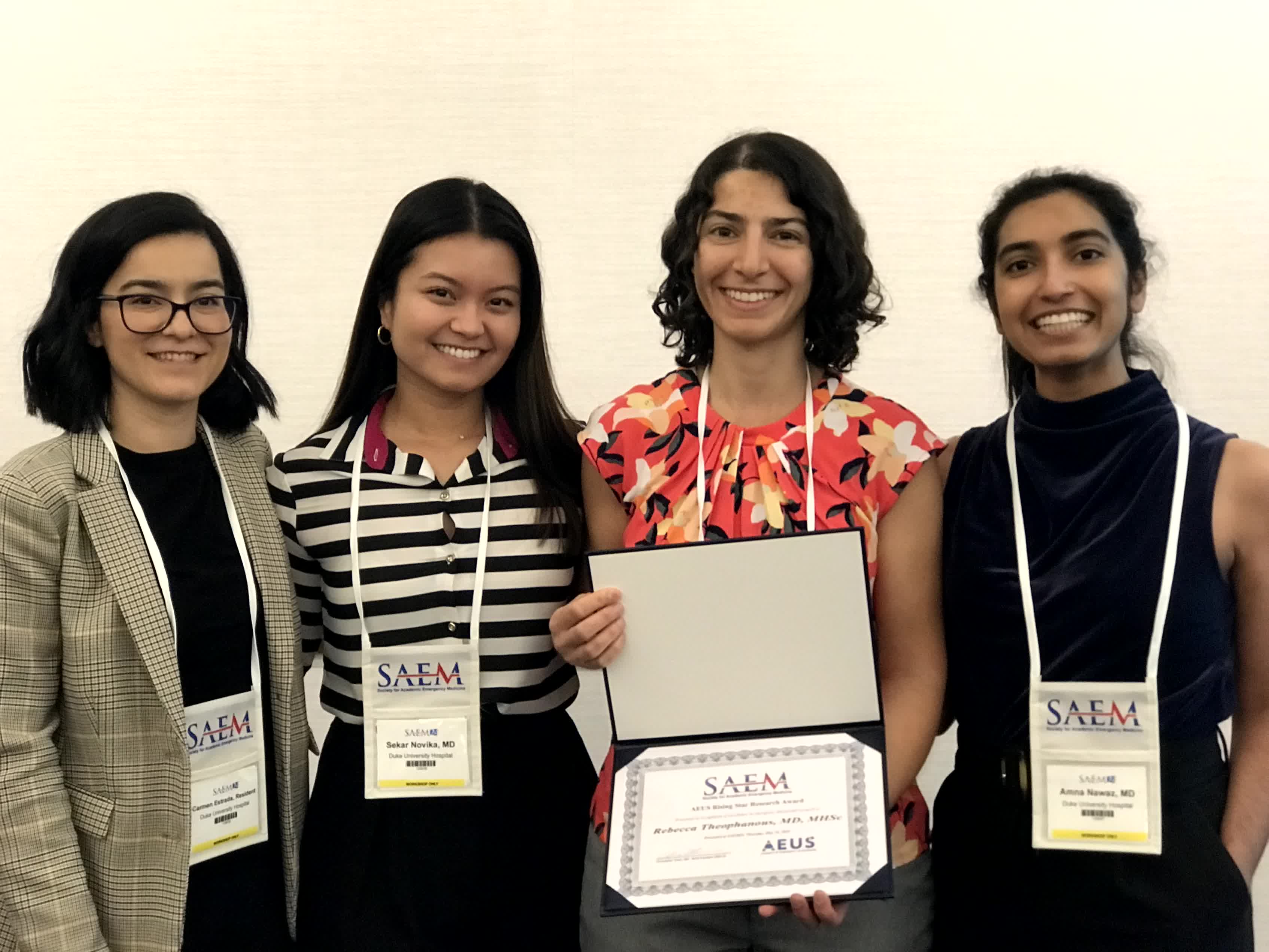 Women showing award