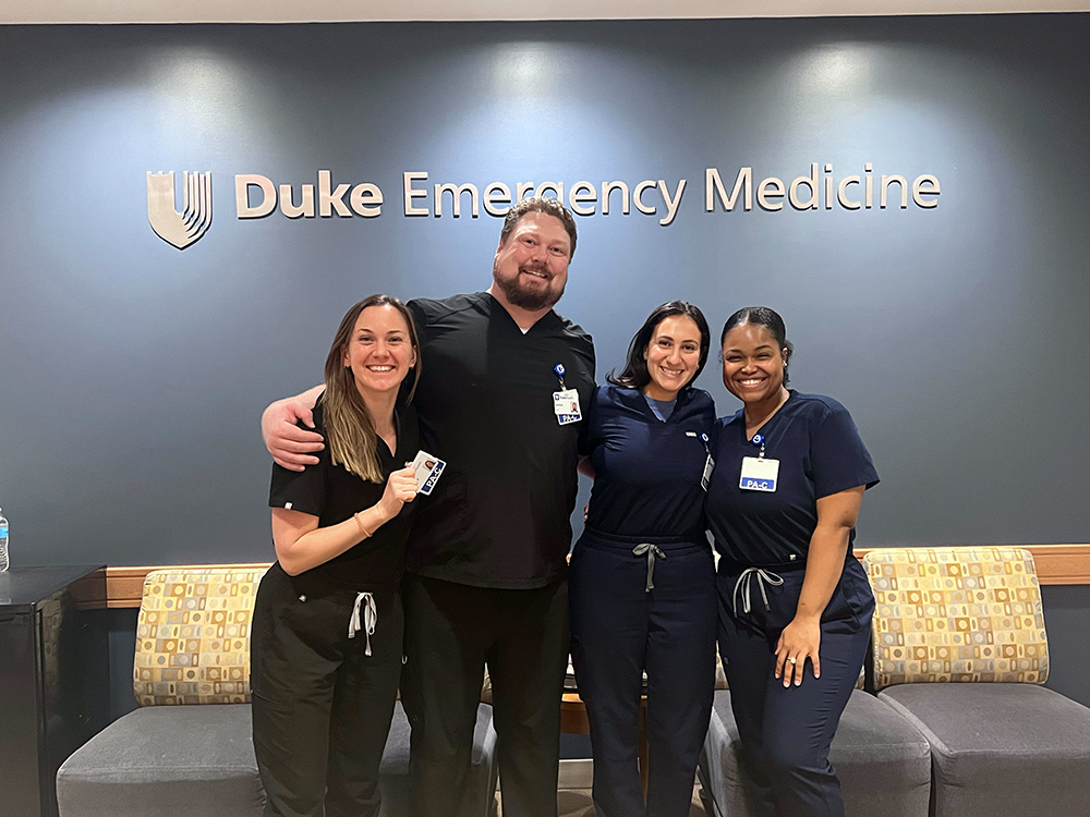 4 EM APP Residents posing together
