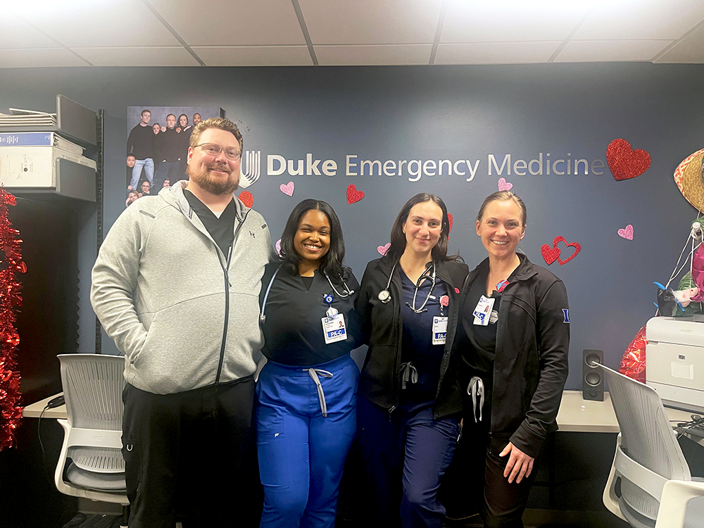 4 EM APP Residents posing together