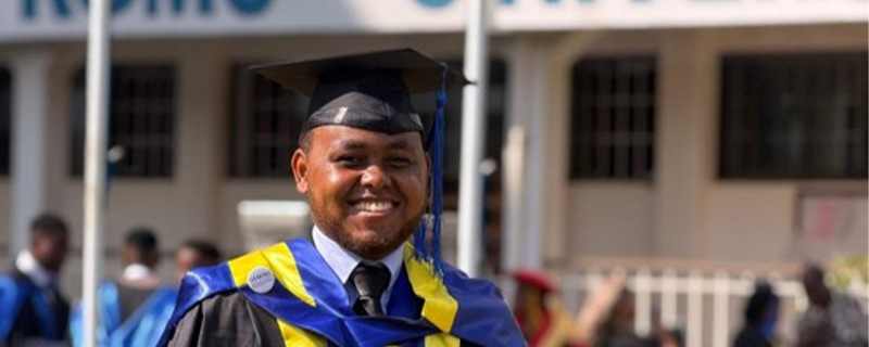 Student in their graduation regalia