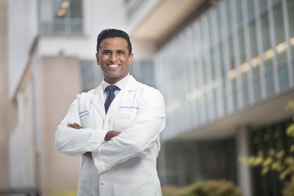 Dr. John Purakal