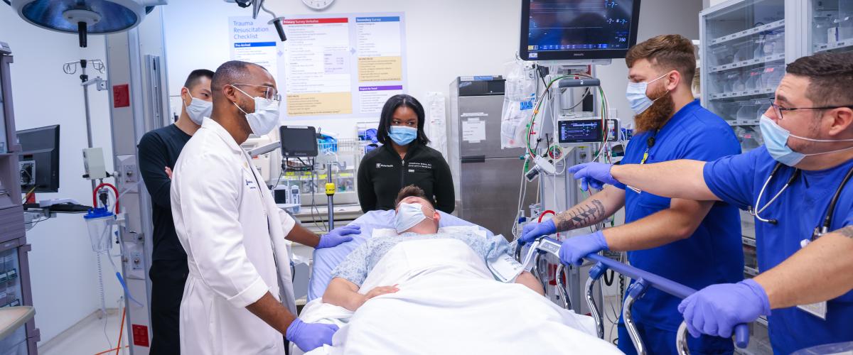 Dr. Kendrick Kennedy conducts training for Emergency Medicine resident physicians